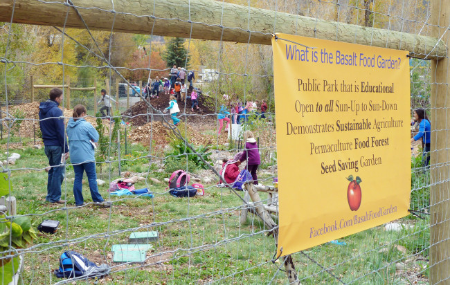 Teachers and students explore a forest food garden in Basalt, CO. 